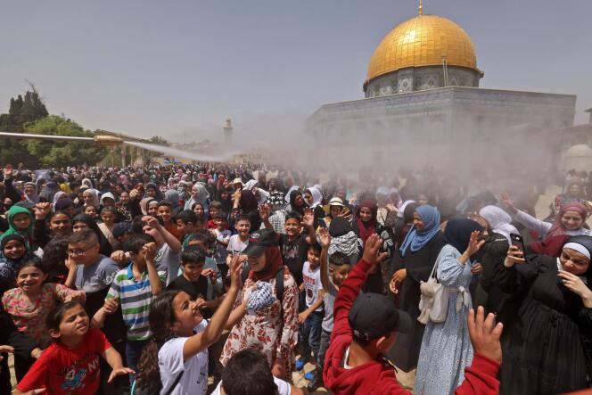 Palestinian worshipers on the last Friday of Ramadan outside Al-Aqsa Mosque in Jerusalem on April 29, 2022.