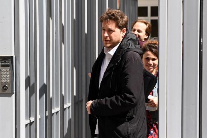 The head of France's Green party (EELV), Julien Bayou, leaves the headquarters of Jean-Luc Mélenchon's La France Insoumise.