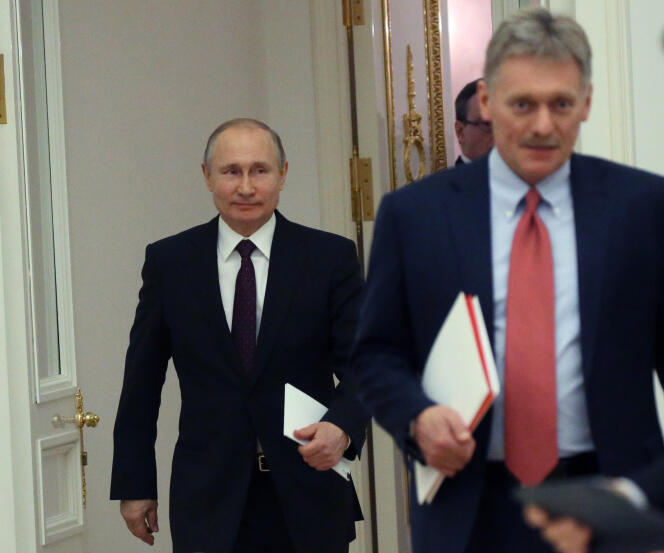 Vladimir Putin and Dmitry Peskov, at the Kremlin, in Moscow, April 28, 2019.