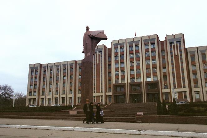 A statue of Lenin sits in front of the Transnistrian government headquarters in Tiraspol on January 17, 2001.