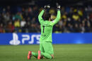 Liverpool's goalkeeper Alisson celebrates a goal during the Champions League semi final, second leg soccer match between Villarreal and Liverpool at the Ceramica stadium in Villarreal, Spain, Tuesday, May 3, 2022. (AP Photo/Jose Breton)