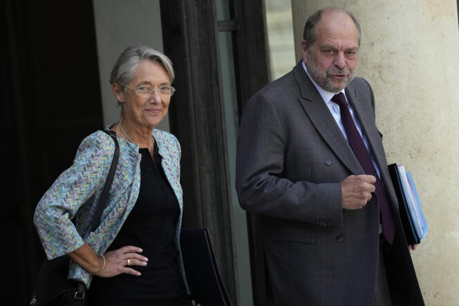 Le ministre de la justice, Eric Dupond-Moretti, avec Elisabeth Borne, alors ministre du travail, le 4 mai 2022, à l’Elysée, à Paris.