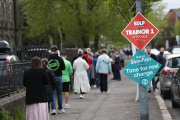 Irish people wait to vote in the local elections on May 5, 2022, in Belfast.