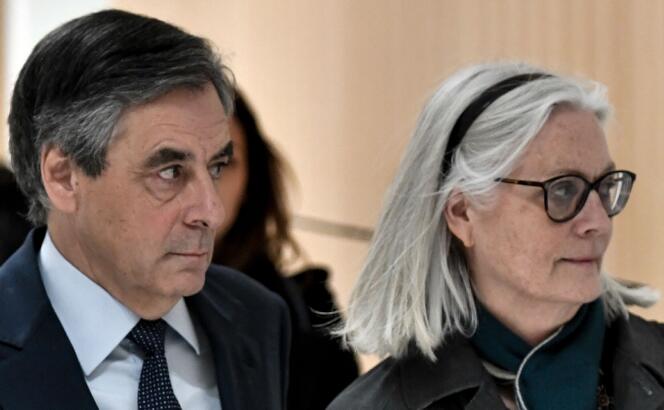 Former Prime Minister François Fillon and his wife, Penelope, at the Paris courthouse on February 27, 2020.