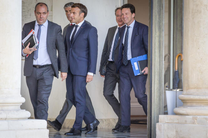 Emmanuel Macron welcoming trade unions and employers' organizations to the Elysee Palace on June 24, 2020 pictured here with Laurent Berger (CFDT, French democratic confederation of labor) and Geoffroy Roux de Bézieux (Medef, French business movement).