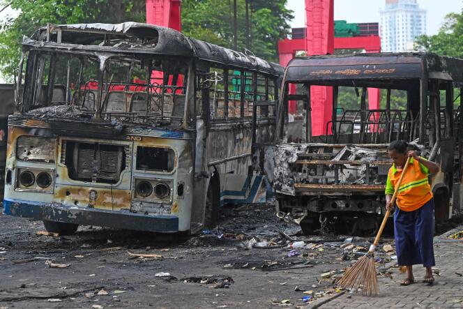 Buses set on fire, in Colombo, the capital of Sri Lanka, on May 10, 2022.