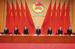 In this photo released by Xinhua News Agency, Chinese President Xi Jinping, center leads other top leaders during a ceremony marking the 100th anniversary of the founding of the Communist Youth League of China at the Great Hall of the People in Beijing on Tuesday, May 10, 2022. Chinese President Xi Jinping on Tuesday promoted the role of the ruling Communist Party's youth wing ahead of a key party congress later this year that comes amid rising economic and social pressures. (Li Xueren/Xinhua via AP)