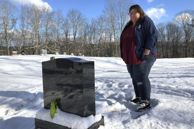 FILE - Deb Walker visits the grave of her daughter, Brooke Goodwin, Thursday, Dec. 9, 2021, in Chester, Vt. Goodwin, 23, died in March of 2021 of a fatal overdose of the powerful opioid fentanyl and xylazine, an animal tranquilizer that is making its way into the illicit drug supply. According to provisional data released by the Centers for Disease Control and Prevention on Wednesday, May 11, 2022, more than 107,000 Americans died of drug overdoses in 2021, setting another tragic record in the nation’s escalating overdose epidemic. (AP Photo/Lisa Rathke, File)