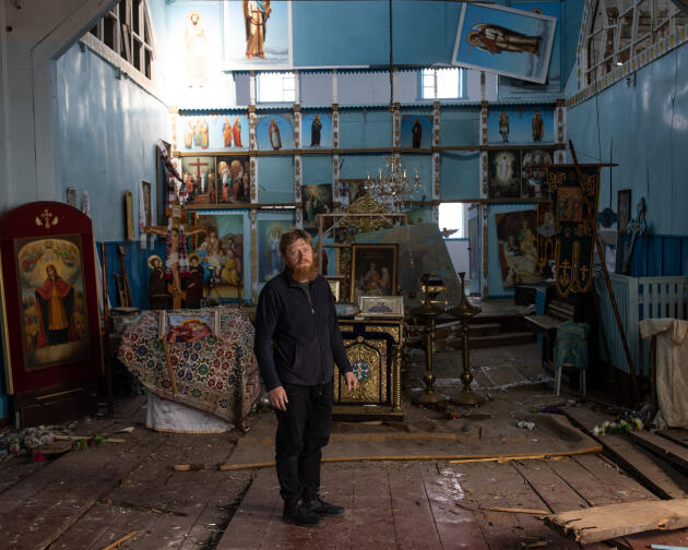 The priest in the church partly ravaged by bombing and fighting. In a village northeast of Kyiv, Ukraine, May 2, 2022.