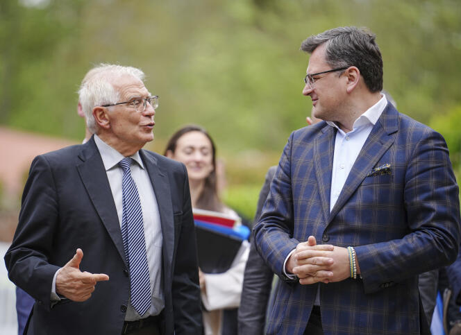 EU diplomatic chief Josep Borrell (left) and his Ukrainian counterpart Dmytro Kuleba at a summit of G7 foreign ministers in Weissenhaeuser Strand, Germany, May 13, 2022.