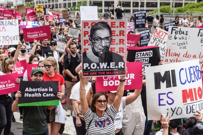 Abortion rights supporters march over the Brooklyn Bridge during a rally on May 14, 2022 in New York City.