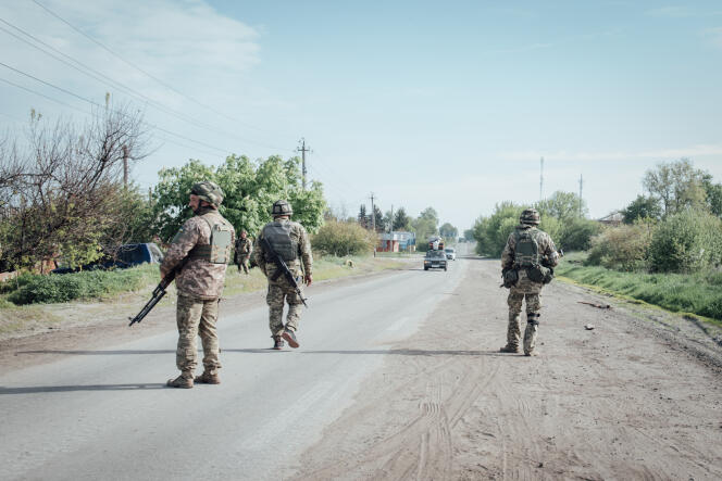 Ukrainian military checkpoints check cars around Kharkiv, May 12, 2022.