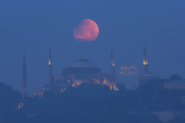 The full moon over the Hagia Sophia Mosque in Istanbul, Turkey, on May 16, 2022.