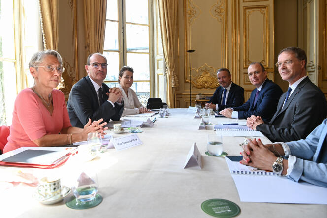 Elisabeth Borne, former energy transition minister, with Prime Minister Jean Castex during a meeting with unions and labor partners at Matignon, July 9, 2020.