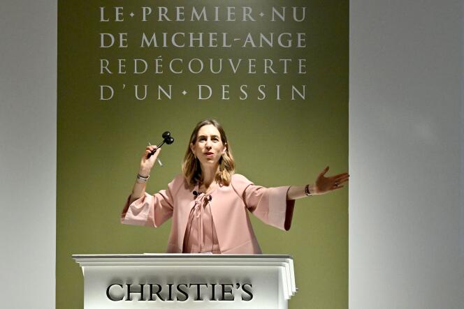 Auctioneer Victoire Gineste chairs the auction of a recently rediscovered drawing by Michelangelo at the Christie's auction house in Paris on May 18, 2022.  