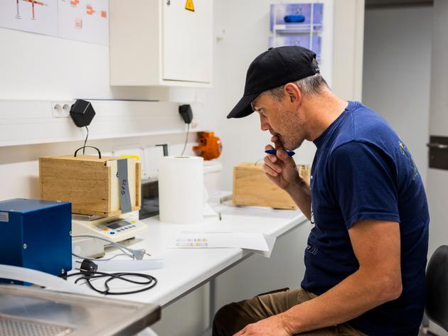 Veterinarian Fabrice Capber weighs each hamster at the CNRS laboratory, before it is released into the field. At Strasbourg, May 13, 2022.