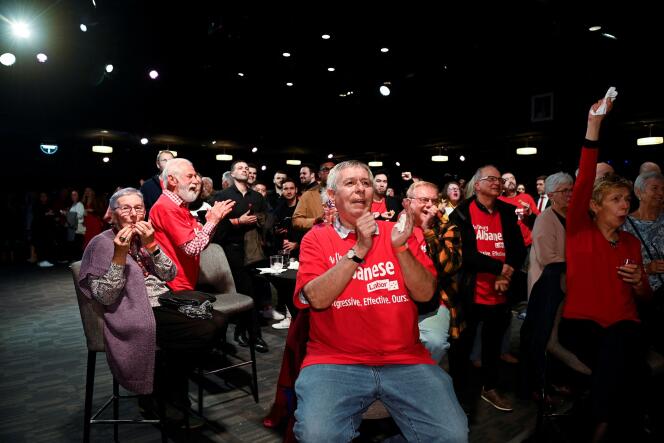 Supporters react while Anthony Albanese, leader of Australia's Labor Party (not pictured), speaks about the outcome of the country's general election in which he ran against incumbent Prime Minister and Liberal Party leader Scott Morrison, in Sydney, Australia, May 21, 2022.