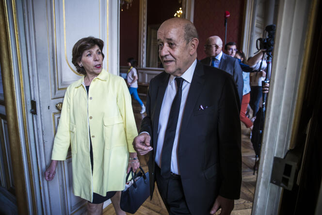 Outgoing French Foreign Minister Jean-Yves Le Drian, right, welcomes newly appointed Foreign Minister Catherine Colonna during the handover ceremony at Foreign Affairs Ministry in Paris, Saturday, May 21 May 2022. Catherine Colonna, a career diplomat and, most recently, France's ambassador to Britain, takes over the foreign affairs portfolio as France is deeply engaged in international efforts to support Ukraine against Russia's invasion and isolate the Kremlin. (Christophe Petit Tesson, Pool via AP)