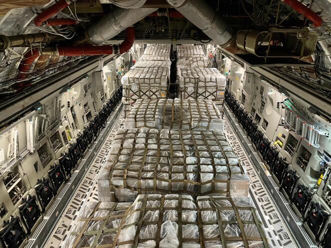 A US Air Force plane, loaded with baby milk, flies from Germany to Indianapolis airport on May 22, 2022.