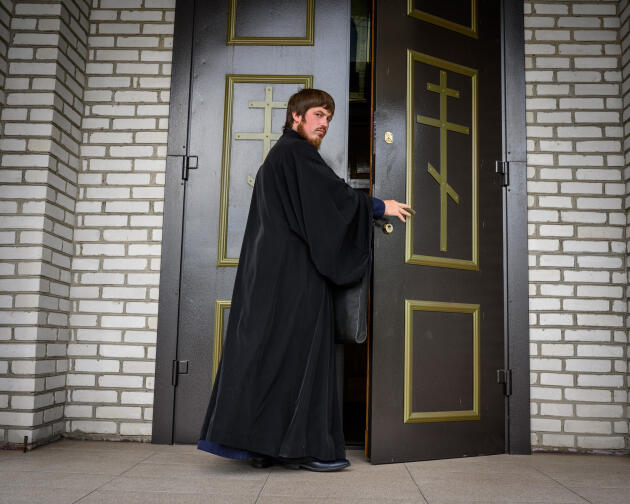 Father Pavlo enters the church in Nove Zalissia on May 20, 2022.