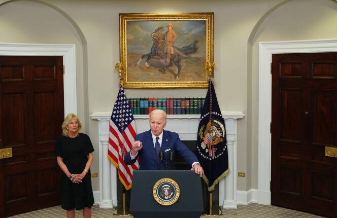 First Lady Jill Biden listens as US President Joe Biden delivers remarks in the Roosevelt Room of the White House in Washington, DC, on May 24, 2022.