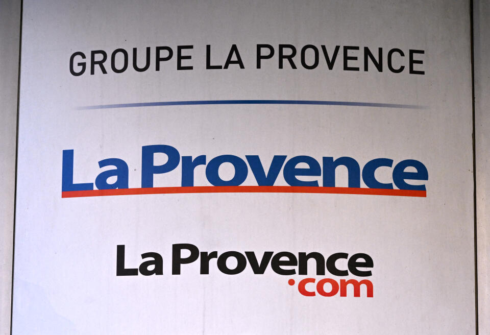 A picture shows a logo on a plaque outside the headquarters of French regional daily newspaper La Provence, in Marseille, southeastern France, on February 15, 2022. (Photo by Christophe SIMON / AFP)