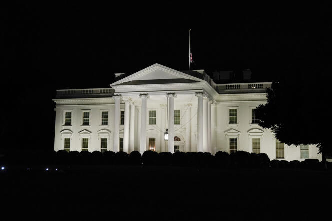 The American flag flies at half staff after President Joe Biden spoke about the mass shooting at Robb Elementary School in Uvalde, from the White House, in Washington, May 24, 2022.