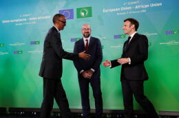 Rwanda's President Paul Kagame is welcomed by French President Emmanuel Macron and European Council President Charles Michel during the European Union - African Union summit in Brussels, Belgium, February 17, 2022. Olivier Hoslet/Pool via REUTERS