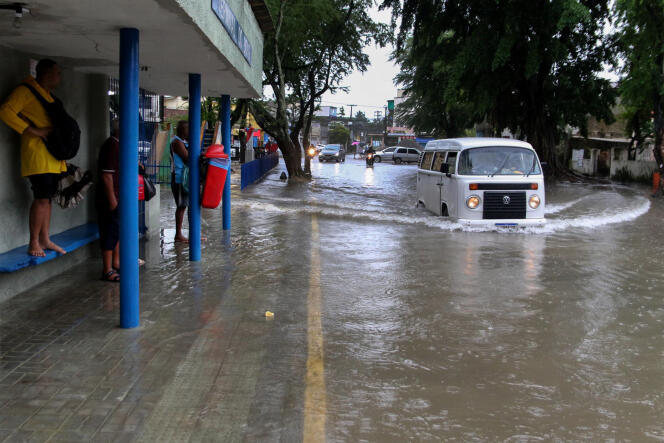 Residents try to escape the floods in Recife in the state of Pernambuco in Brazil, May 28, 2022.