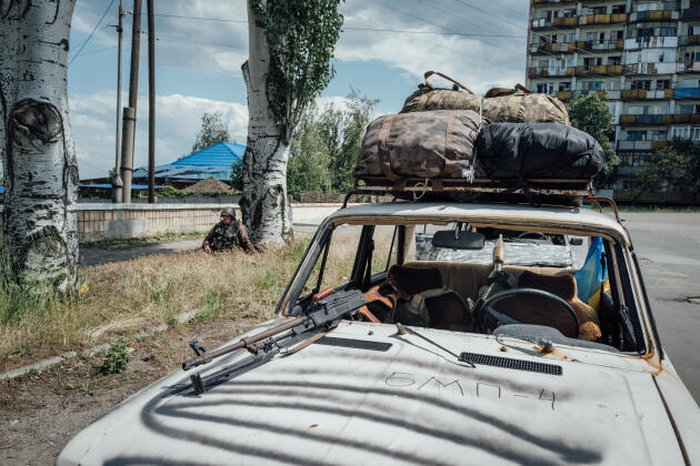 A soldiers' car with "BMD-4" written on it, referring to the Russian armored infantry fighting vehicle. The military still present lacks defensive means. In Lysychansk, Ukraine, May 27, 2022.