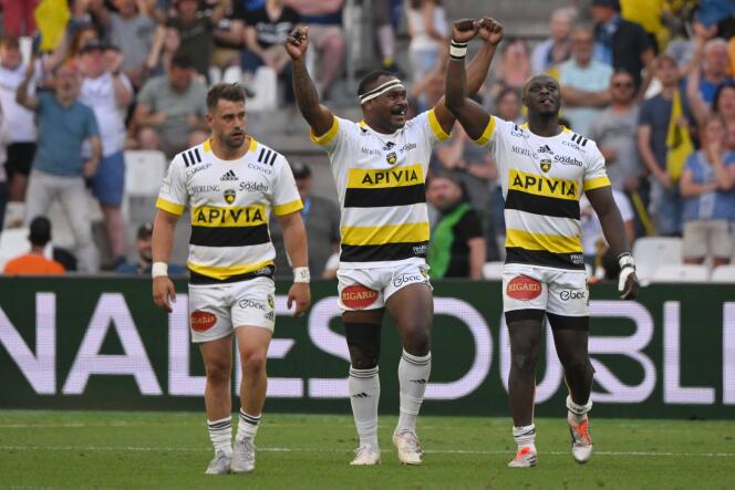 La Rochelle's French wing Artur Retiere (L) celebrates with teammates after scoring during the European Rugby Champions Cup at the Velodrome Stadium in Marseille, southeastern France, on May 28, 2022.