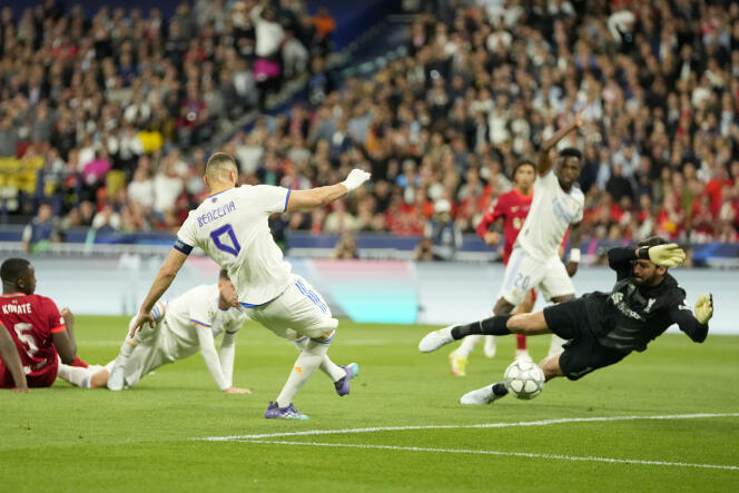 Real Madrid's Karim Benzema scores a goal disallowed for offside during the Champions League final, Saturday, May 28, 2022.