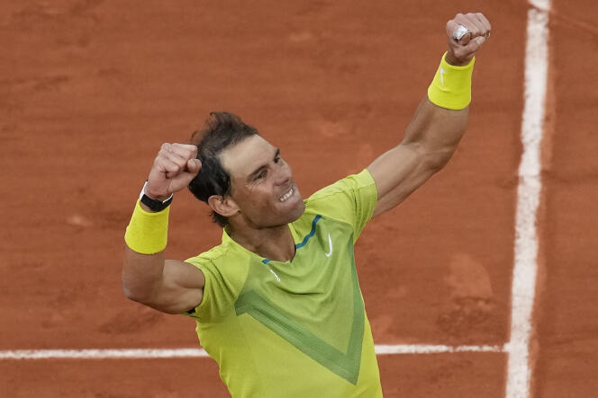 Spain's Rafael Nadal celebrates winning against Canada's Felix Auger-Aliassime in 5 sets, 3-6, 6-3, 6-2, 3-6, 6-3, during their fourth round match at the French Open tennis tournament in Roland Garros stadium in Paris, France, Sunday, May 29, 2022. 
