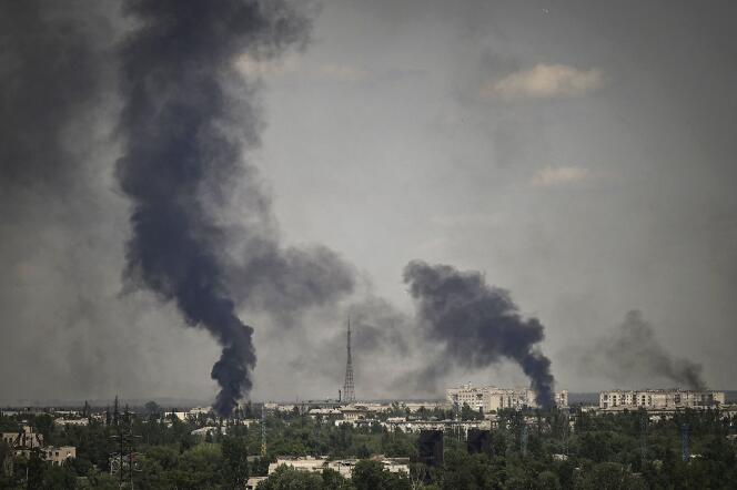 Smoke rises in the city of Sievierodonetsk during heavy fightings between Ukrainian and Russian troops at eastern Ukrainian region of Donbas on May 30, 2022. 