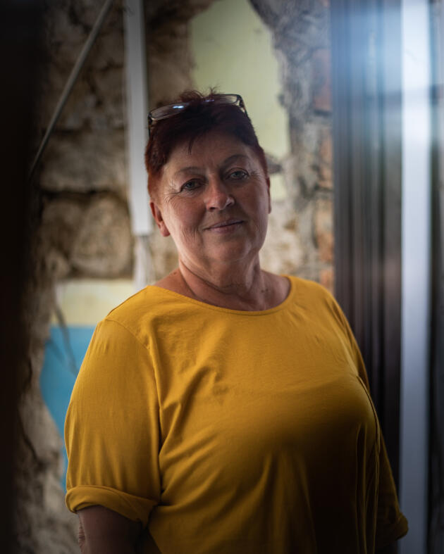 Natalya Panashyi, 53, mayor of Lymany (Ukraine), in the village town hall destroyed by Russian bombing, on May 26, 2022.