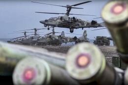 In this handout photo released by the Russian Defense Ministry Press Service released on Saturday, May 28, 2022, A KA-52 helicopter gunship takes off for a mission at an undisclosed location in Ukraine. (Russian Defense Ministry Press Service via AP)