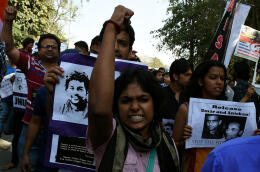 Indian students and activists hold placards during a protest against the arrest of an Indian student on sedition charges in New Delhi on March 15, 2016. - Students and activists are demanding the release of Umar Khalid and Anirban Bhattacharya, who were arrested along with their union president last month on sedition charges. (Photo by MONEY SHARMA / AFP)