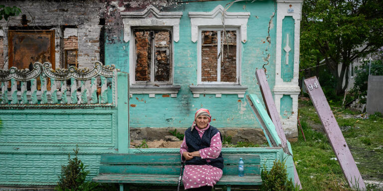 Andrievka- Oleksiy Mel street. Kyiv region- Ukraine- May 27, 2022- Mrs. Nadia Vorobey in front of her house destroyed during bombing on March 18, 2022 at 2 pm during the Russian invasion. The village is located between Borodyanka and Makariv, 60 km from Kyiv. Before the Russian invasion of Ukraine, the village had 1500 inhabitants. The village was occupied by the Russian army from February 28 to March 31, 2022.