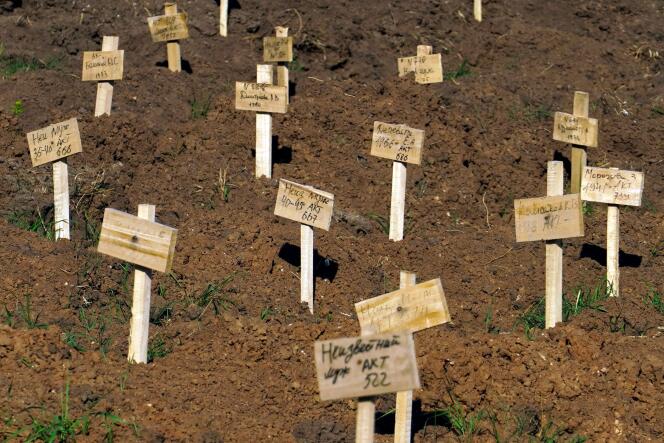 Fresh graves are seen at a cemetery in the city of Mariupol on June 2, 2022, amid the ongoing Russian military action in Ukraine. 