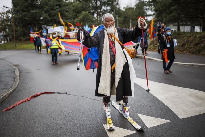 Before the opening of the Beijing Winter Olympics, Tibetan musician and refugee Loten Namling walked through Switzerland on skis while dragging a Chinese flag behind him to call attention to the fate of Tibetans, in Lausanne February 3, 2022.