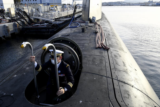 An officer exits the 'Suffren,' the French Navy's new nuclear attack submarine, docked in the Toulon harbor, November 6, 2020.