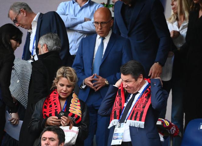 The mayor of Nice, Christian Estrosi, his wife, Laura Tenoudji, and, behind them, the deputy Les Républicains Eric Ciotti, at the Stade de France, in Saint-Denis (Seine-Saint-Denis), on May 7, 2022.
