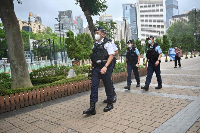 Police patrol an entry to Victoria Park in the Causeway Bay district of Hong Kong on June 4, 2022.