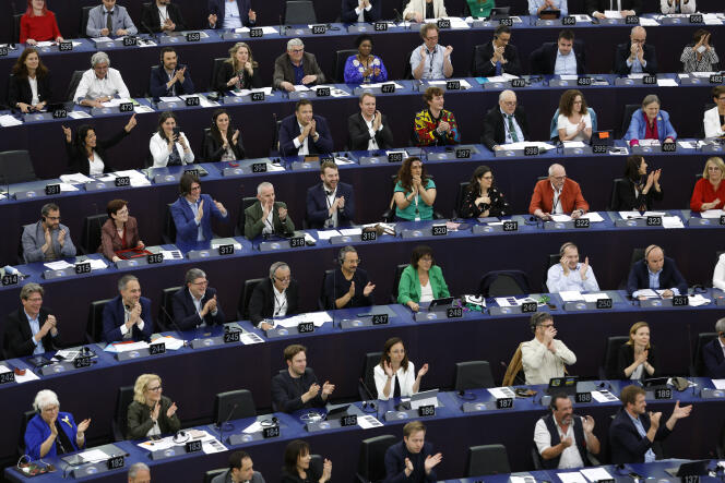 Members of the European Parliament applaud after voting to ban all new internal combustion engines in the European Union from 2035, Strasbourg, June 8, 2022.