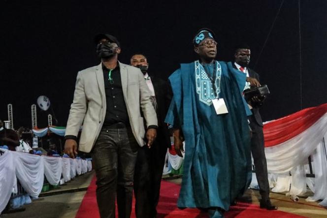 Bola Tinubu (à droite) lors de la convention du Congrès des progressistes à Abuja, le 26 mars 2022.