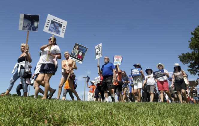 Protesters during the March For Our Lives to demand an end to gun violence, in Parkland, Florida, June 11, 2022.