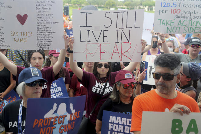 Stephanie Horowitz, 19, a recent graduate of Marjory Stoneman Douglas High School holds up a sign during the March For Our Lives Parkland.
