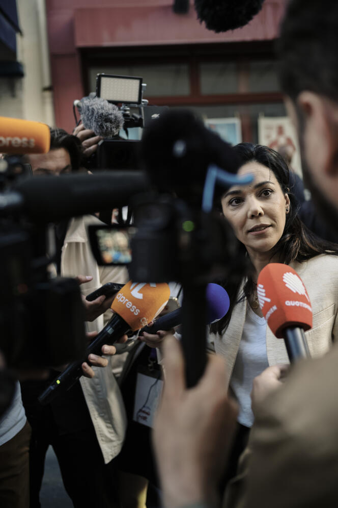 Sophia Chikirou talking with journalists after her victory in the first round of the legislative elections, in Paris, June 12.
