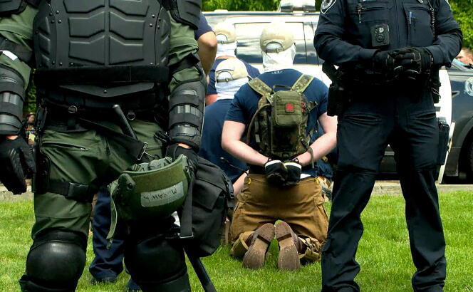 31 men were arrested for conspiracy to riot and are affiliated with the group Patriot Front in Coeur d'Alene (Idaho), June 11, 2022 in a still image from video.