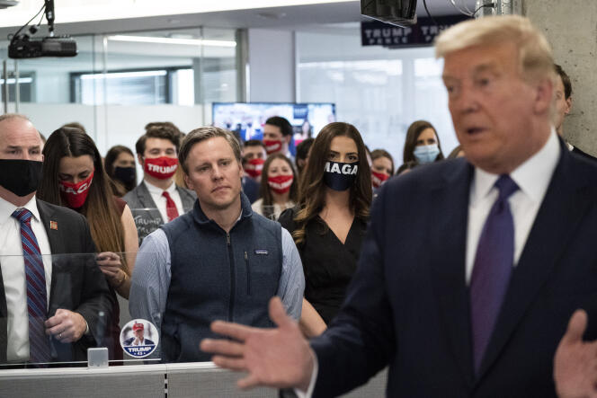 Campaign manager Bill Stepien, left, watches as President Donald Trump speaks at his campaign headquarters in Arlington, Virginia, on election day, Tuesday, November 3, 2020.